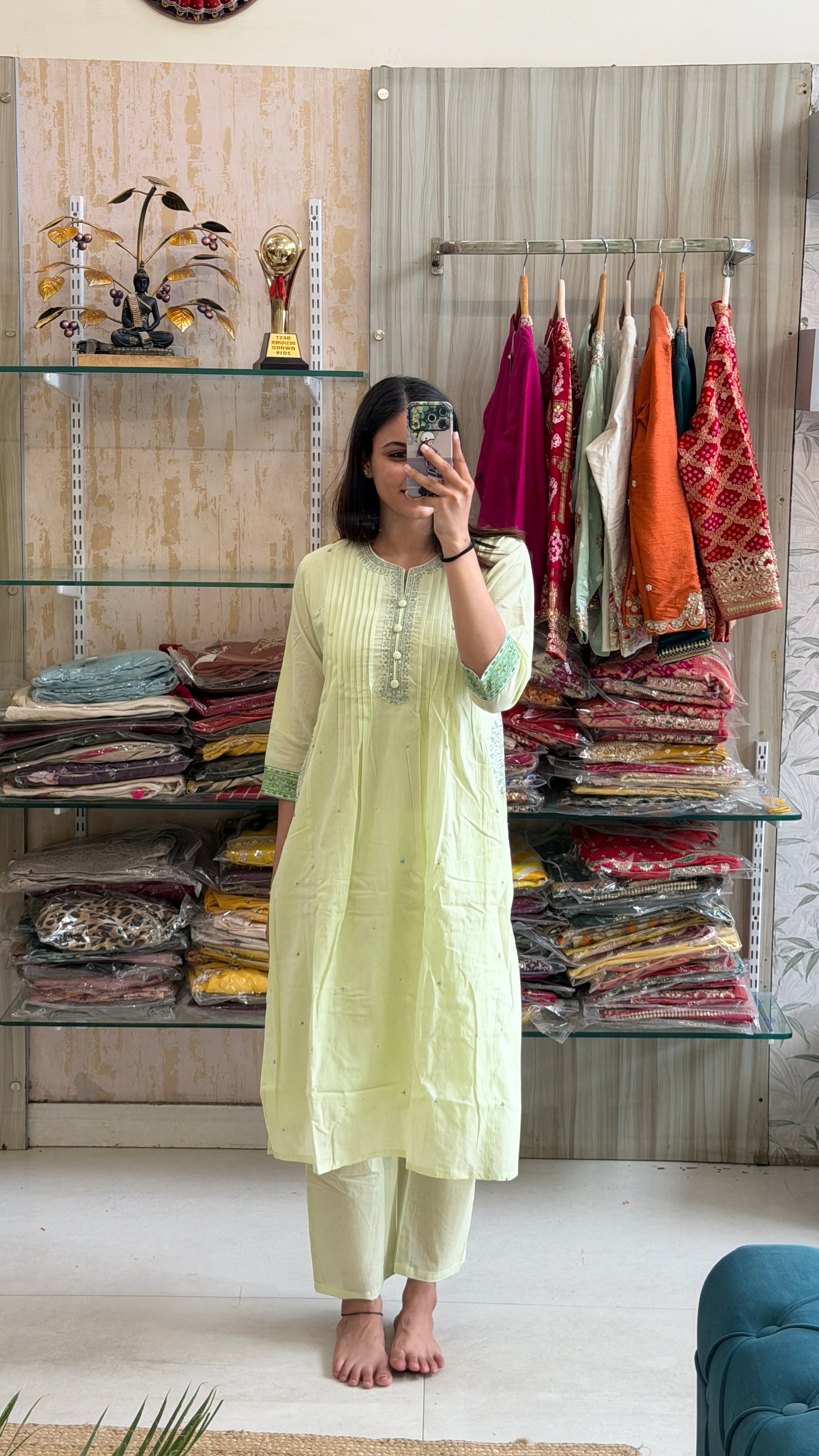 A soothing pastel green suit set that blends timeless elegance with everyday comfort.