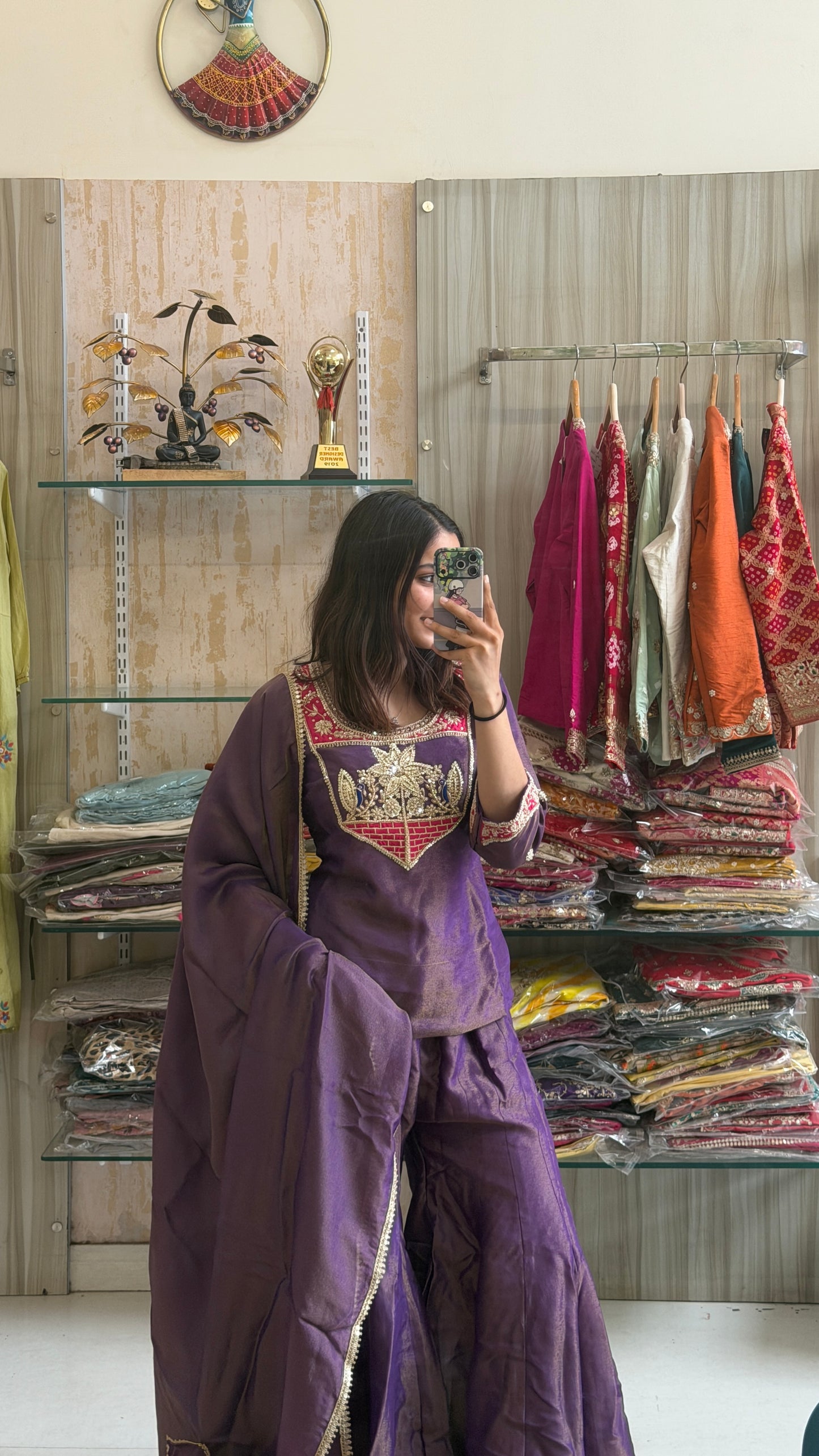 A touch of royalty, a hint of tradition. This Purple Tissue Indo-Western is designed to make every celebration unforgettable. ✨