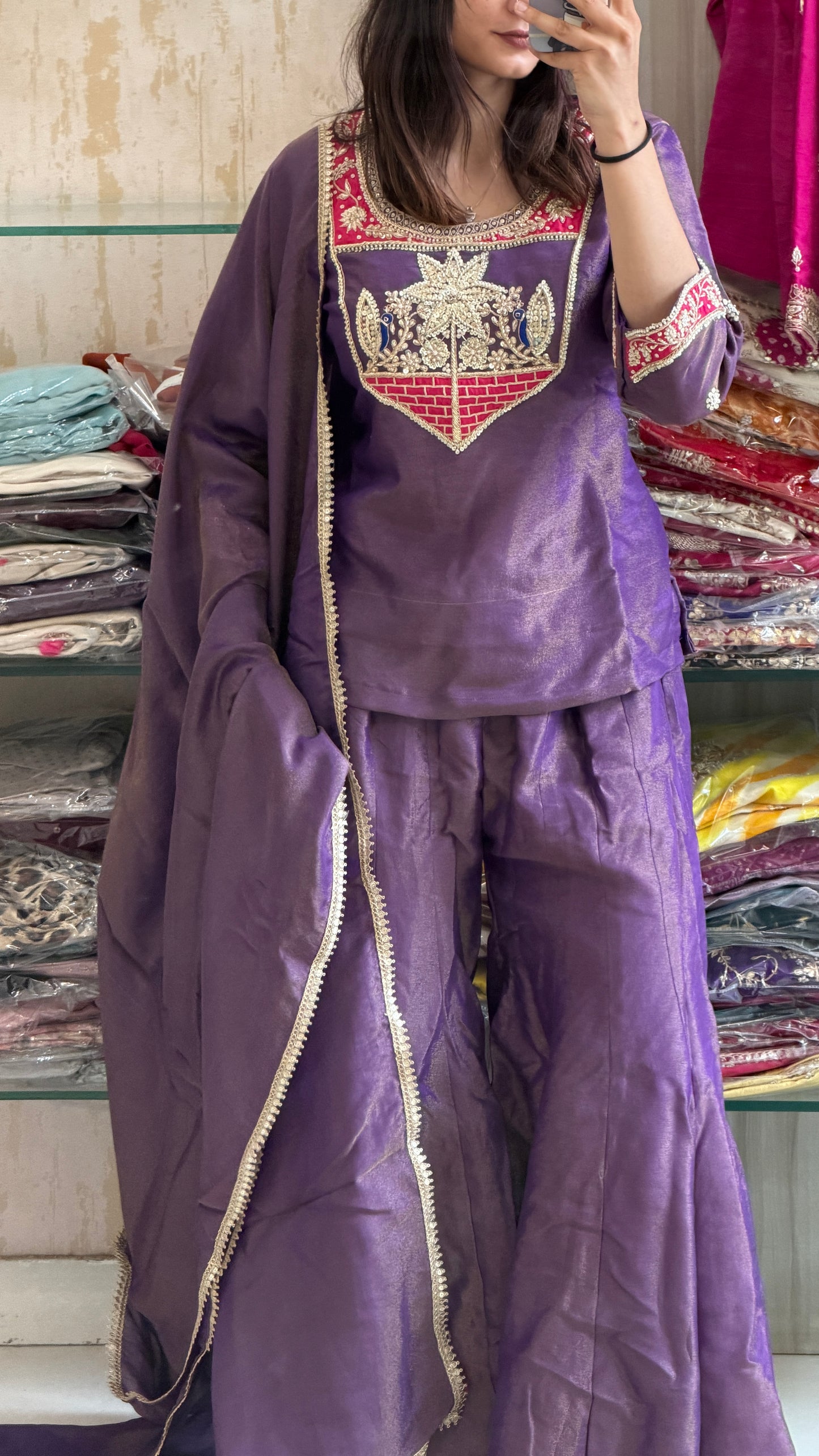 A touch of royalty, a hint of tradition. This Purple Tissue Indo-Western is designed to make every celebration unforgettable. ✨