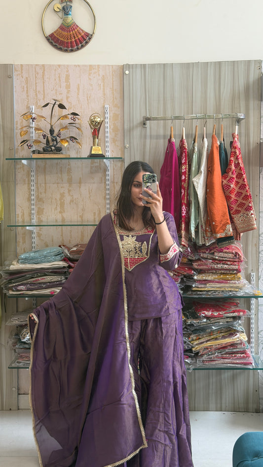 A touch of royalty, a hint of tradition. This Purple Tissue Indo-Western is designed to make every celebration unforgettable. ✨