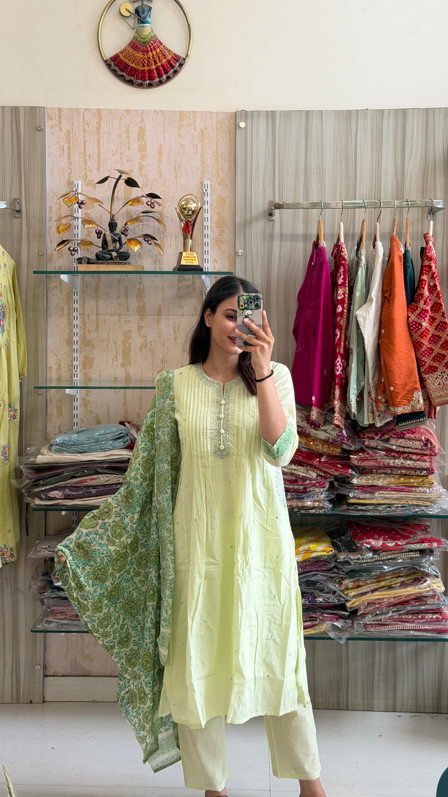 A soothing pastel green suit set that blends timeless elegance with everyday comfort.