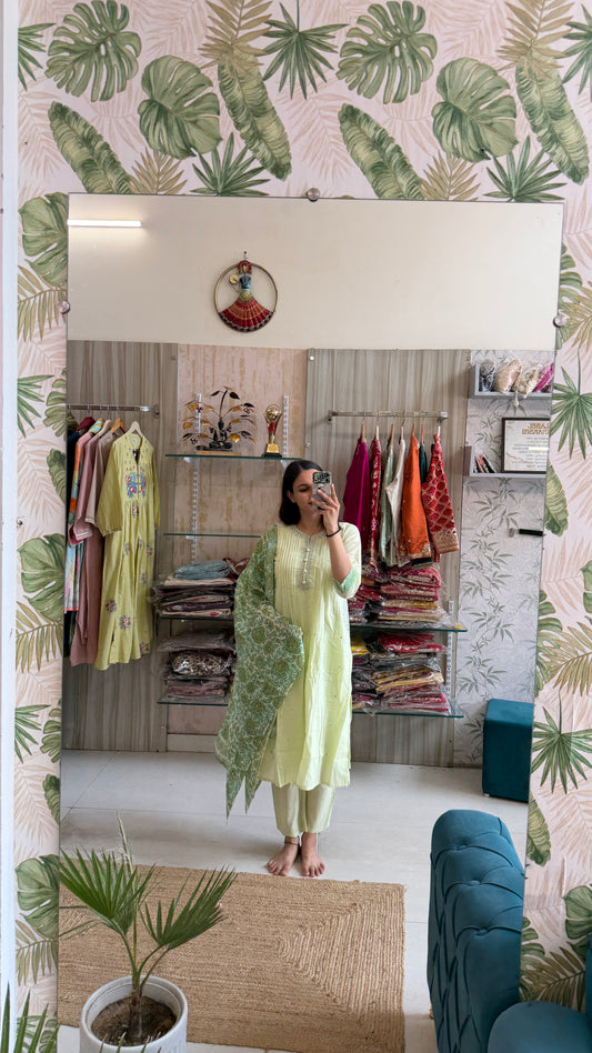 A soothing pastel green suit set that blends timeless elegance with everyday comfort.