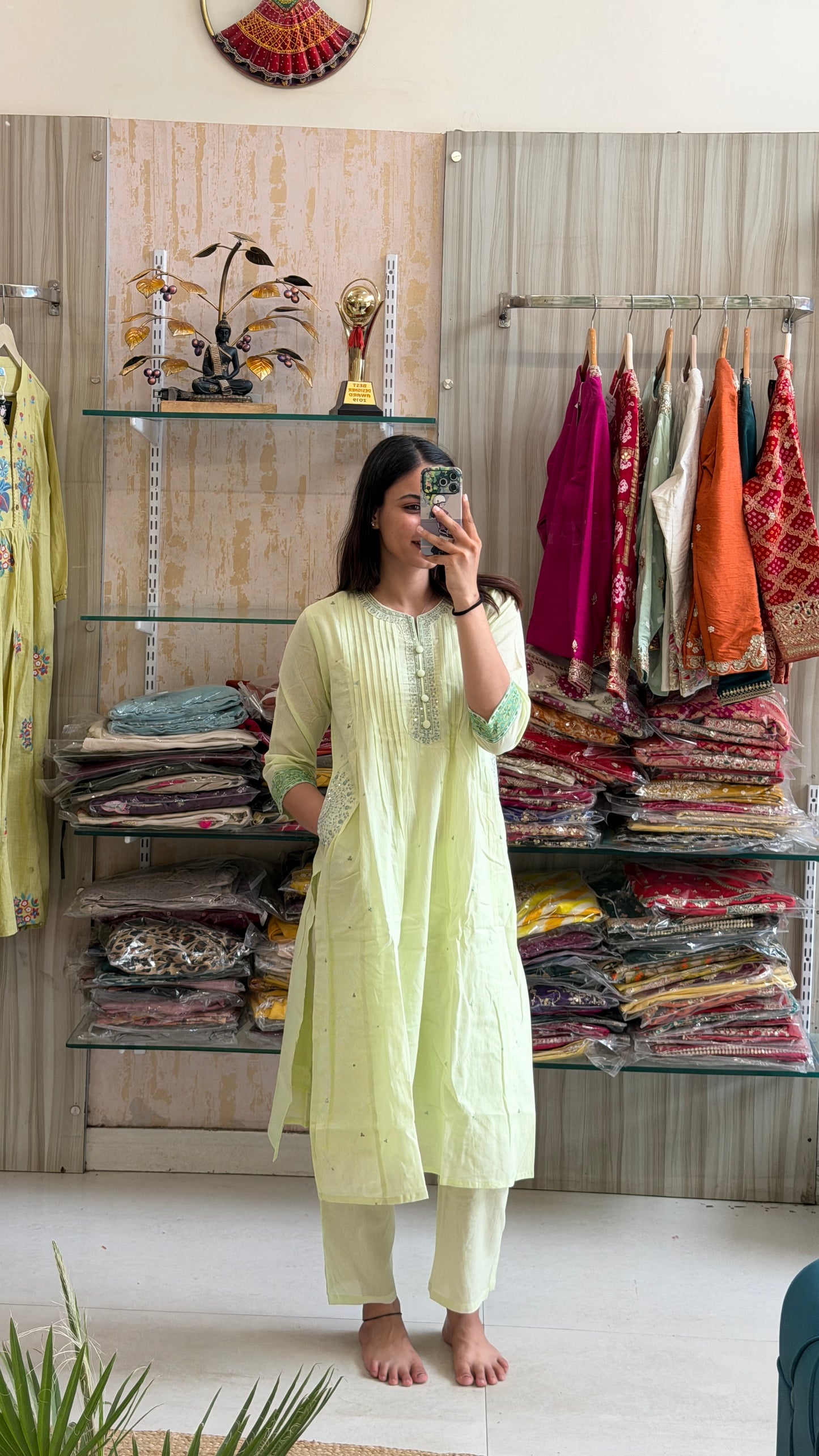 A soothing pastel green suit set that blends timeless elegance with everyday comfort.