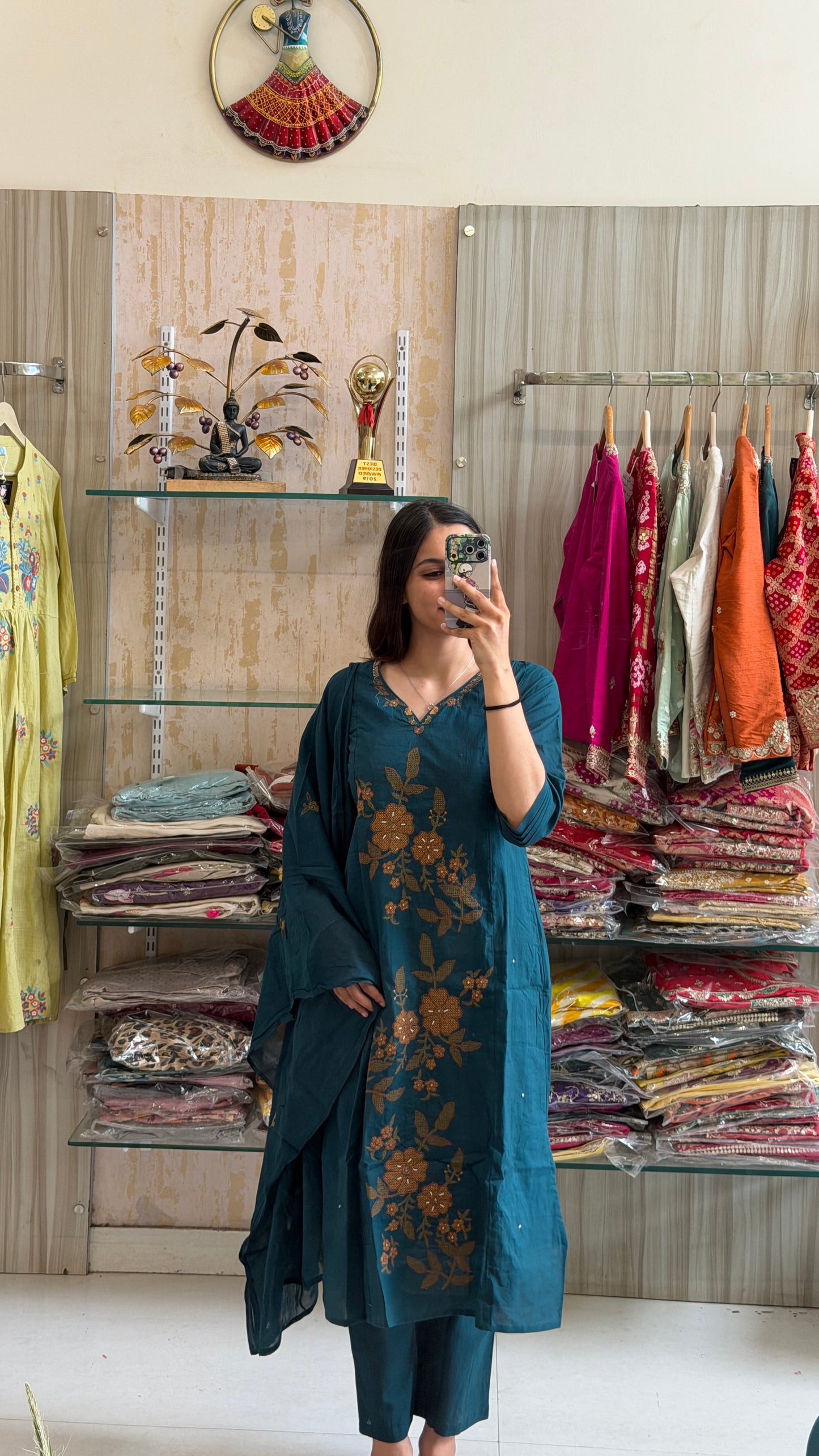 A timeless cotton suit set adorned with elegant floral embroidery