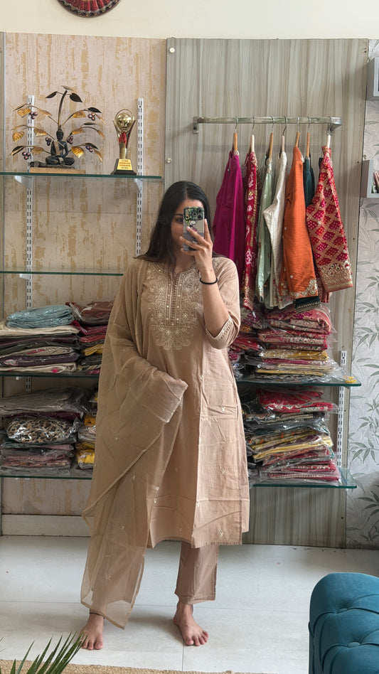 Understated elegance, timeless charm. This embroidered cotton suit set is made for effortless grace. ✨