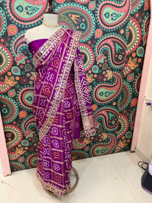 Royal hues, timeless traditions. ✨💜
Drape yourself in the richness of our Purple Gajji Silk Ghatchola Saree.
