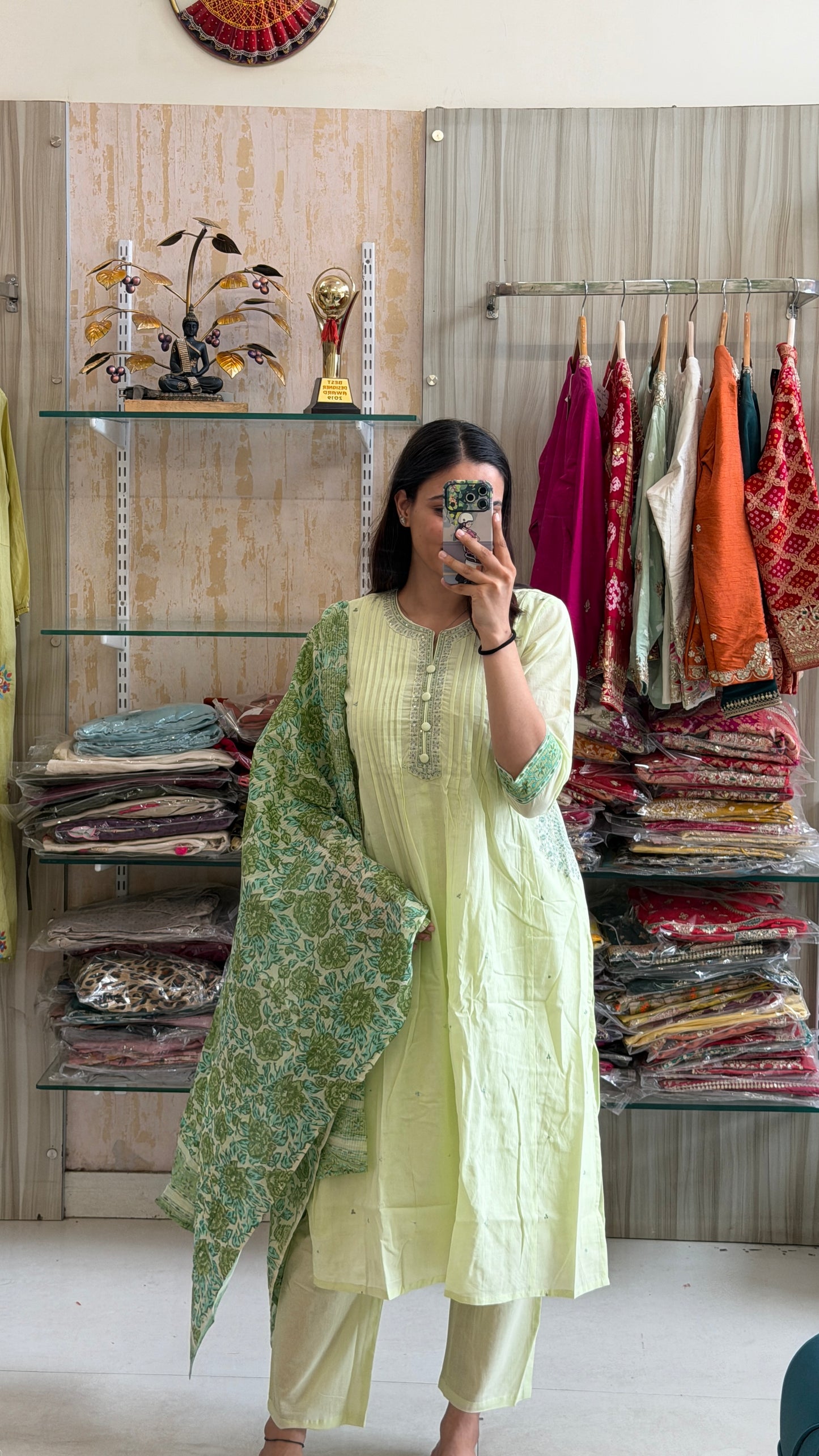 A soothing pastel green suit set that blends timeless elegance with everyday comfort.