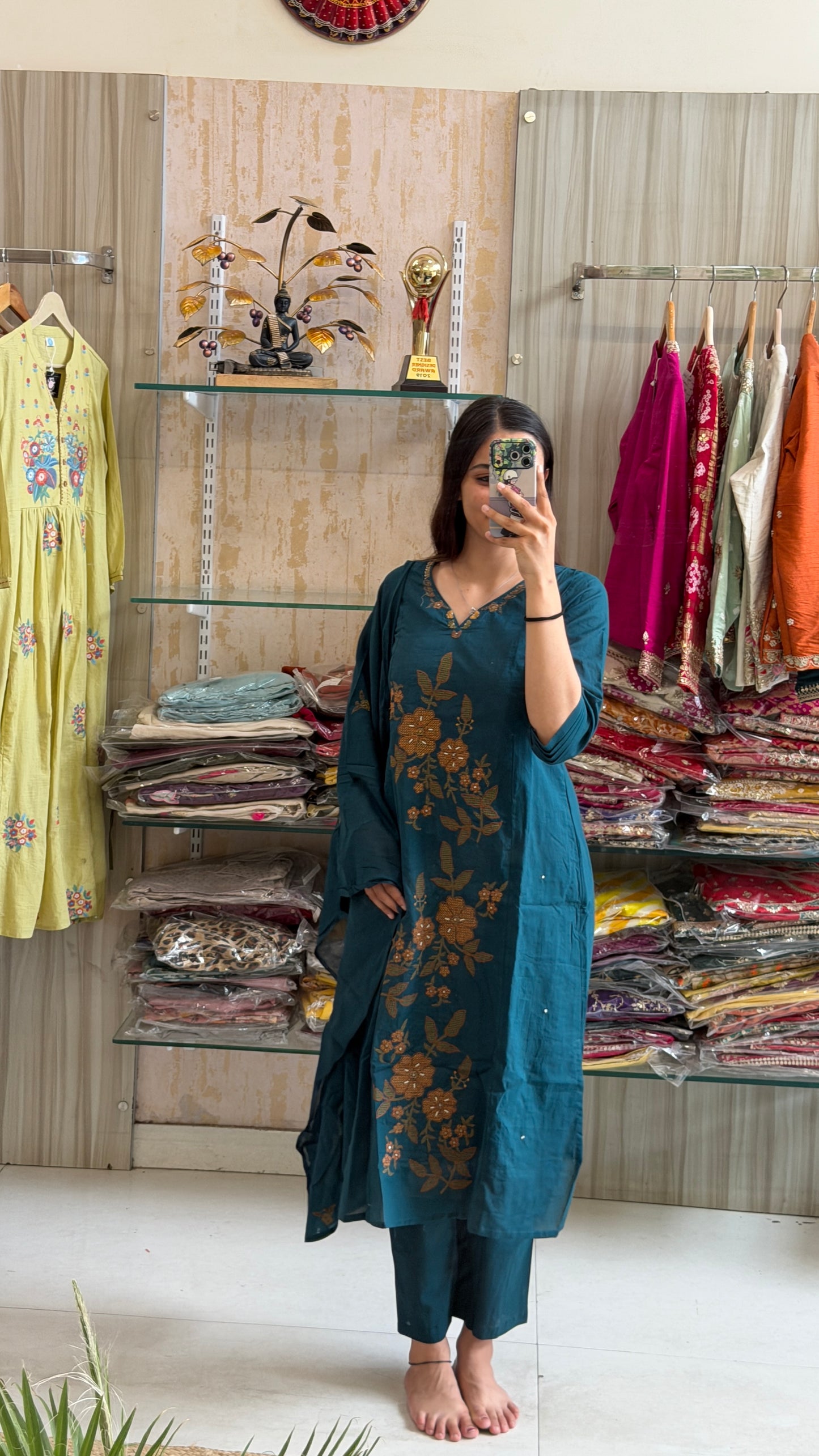 A timeless cotton suit set adorned with elegant floral embroidery