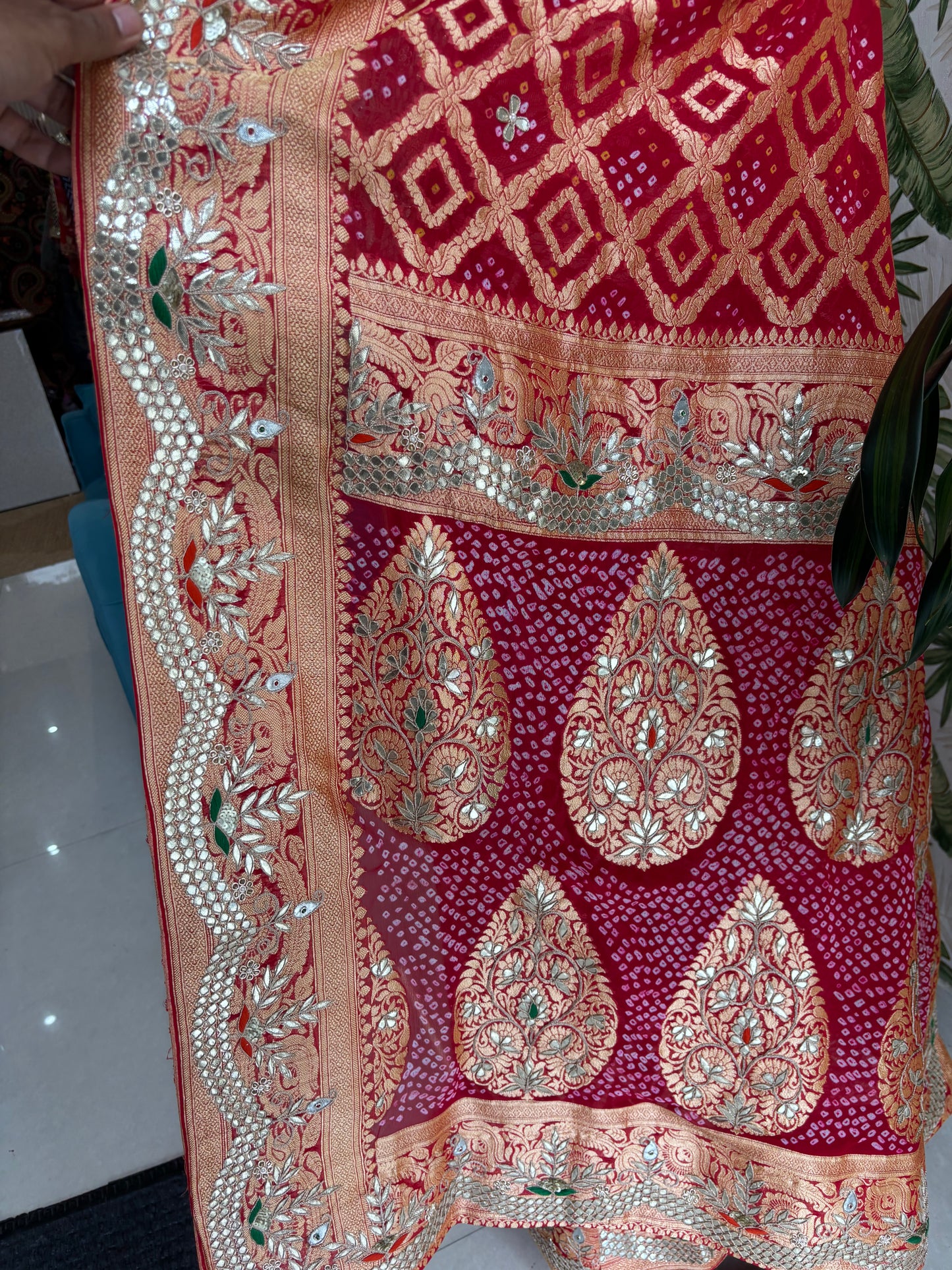 Timeless elegance in every weave. Red Kaddi Zari Gota Patti Saree crafted to make every celebration unforgettable.