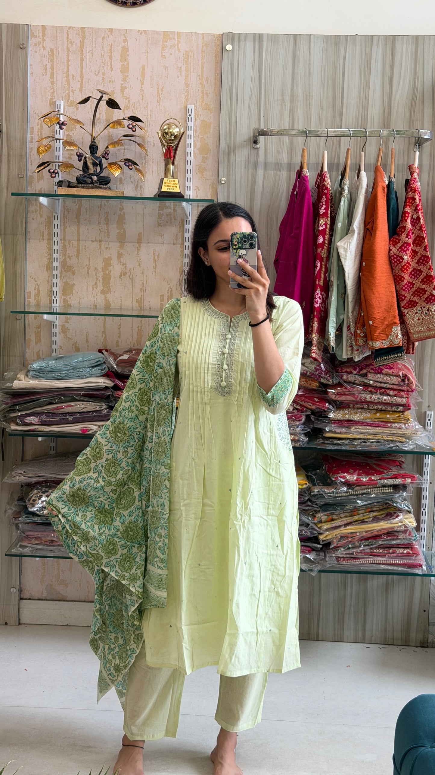 A soothing pastel green suit set that blends timeless elegance with everyday comfort.